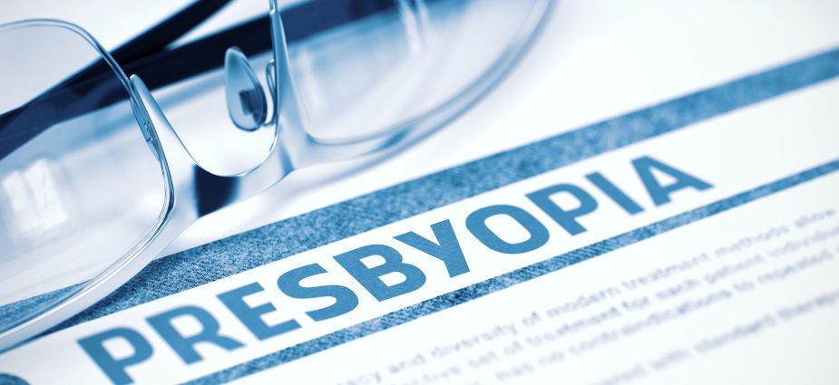 reading glasses sitting on top of a worksheet titled presbyopia